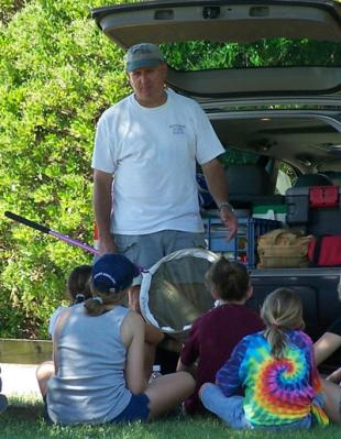 Larry Brindza giving a tagging demonstration<br>to children at Kiptopeke State Park, VA Larry Brindza
